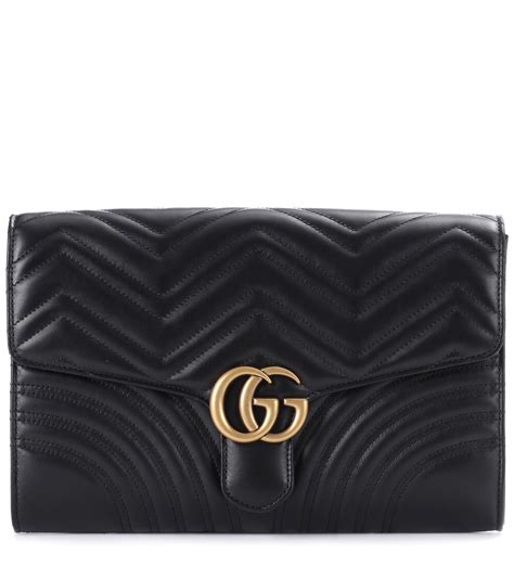 gucci black leather clutch chain|gucci clutch suede.